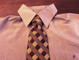 Pour faire un noeud de cravate - 9. Source : http://data.abuledu.org/URI/5335e94e-pour-faire-un-noeud-de-cravate-9