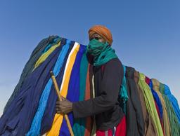 Vendeur de turbans au Mali. Source : http://data.abuledu.org/URI/52d2b724-vendeur-de-turbans-au-mali